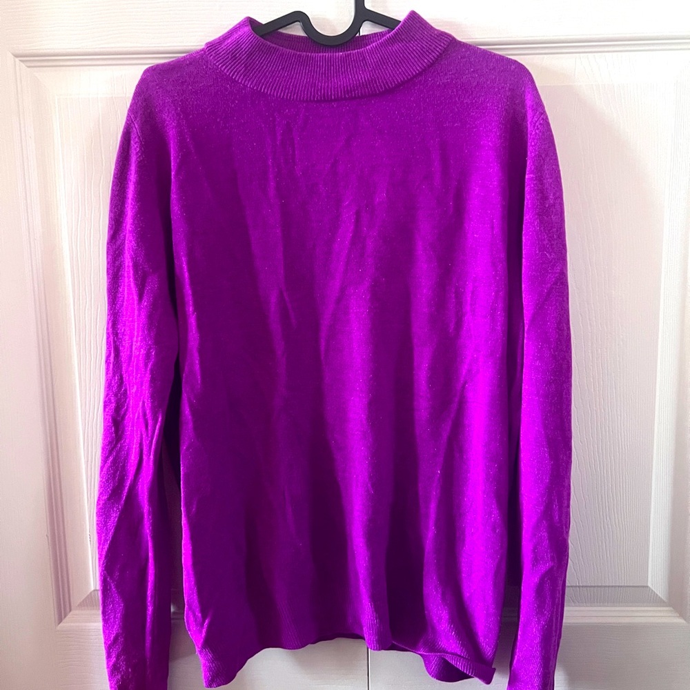 Purple sweater.